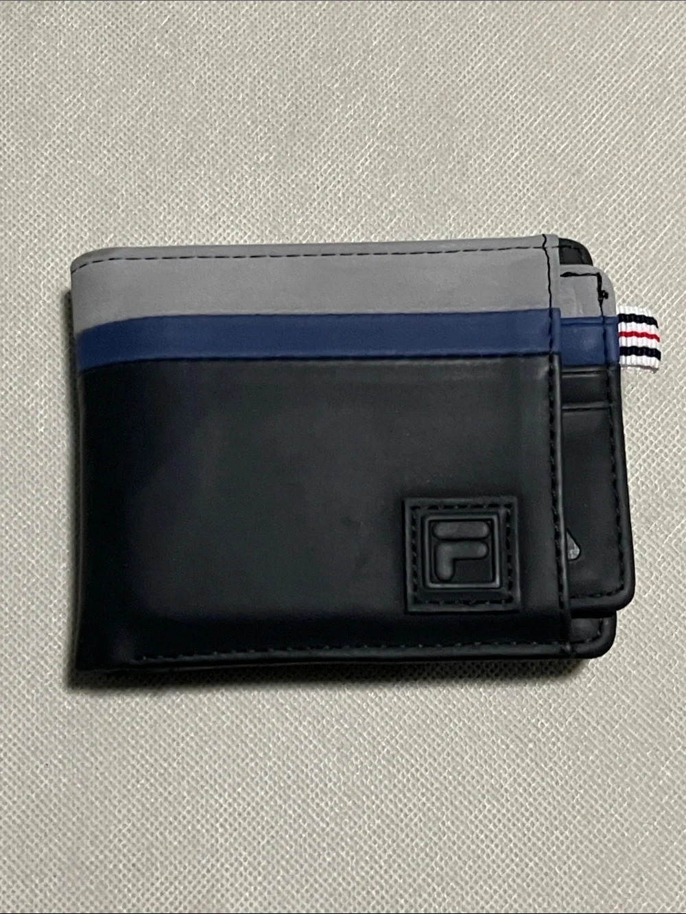 FILA Men's Colorblock Bifold Wallet with a Removable Passcase/Card Holder.